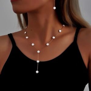 - - Gold Y necklace with matching earrings